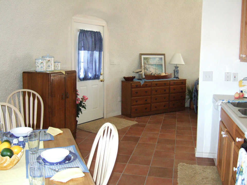 Tile floors — Except for the living room, a handsome, easily maintained tile covers the floors of this dome-home.