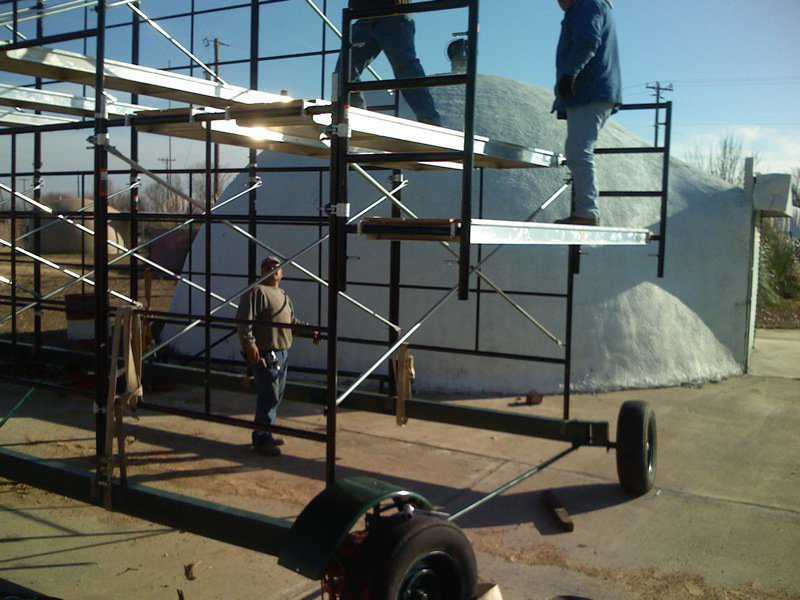 Half piece — Here we have bolted on a half piece of scaffold so that we can stand on top of the wheels.  Our next project will be on a 12’ stem wall.