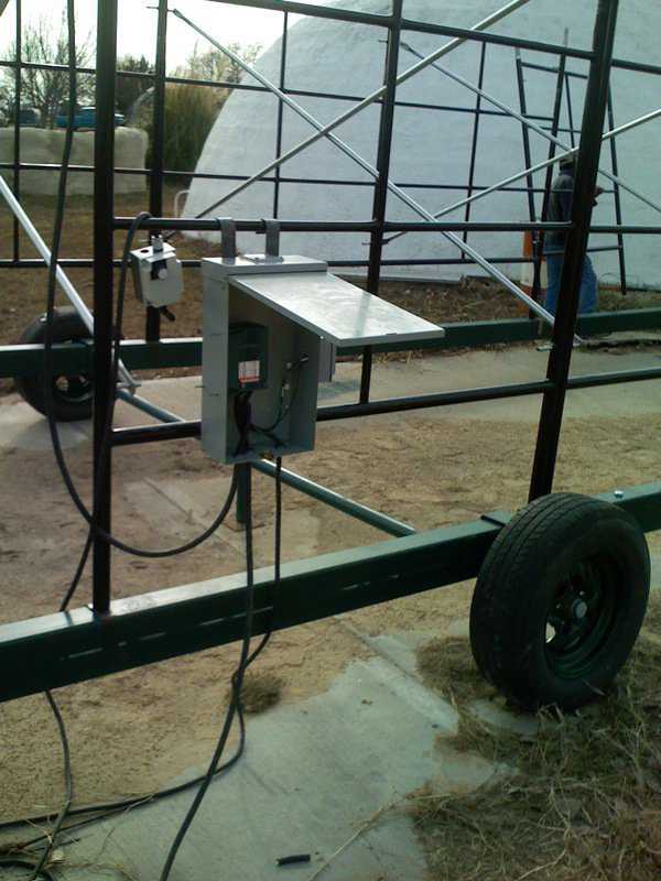 Panel Box — The panel box is 220v and can hang anywhere on the scaffold. It also has plugs on the side that can be used for lights, etc.
