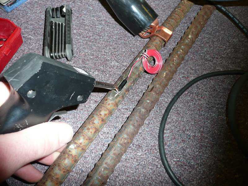 Welding gun — This welding gun has a very fine tip. The welds are done by making multiple spot welds along the sides of the sensor.