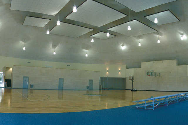 Thousand Oaks Gymnasium near Barry, Texas. — The hanging acoustic panels combat the noise in the gymnasium.