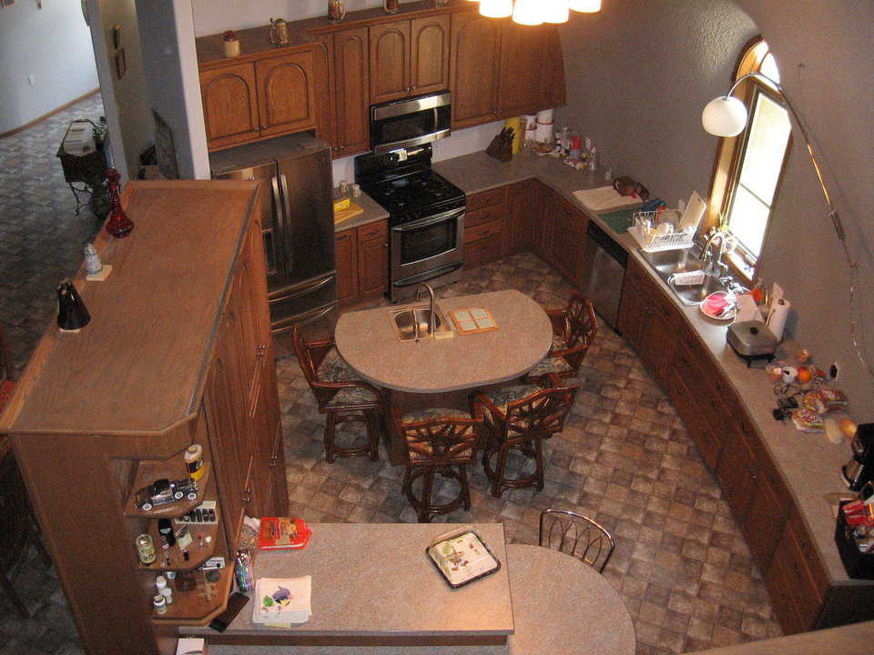 Hungry? — A cabinet separates the dining room and kitchen that has a more casual eating area.