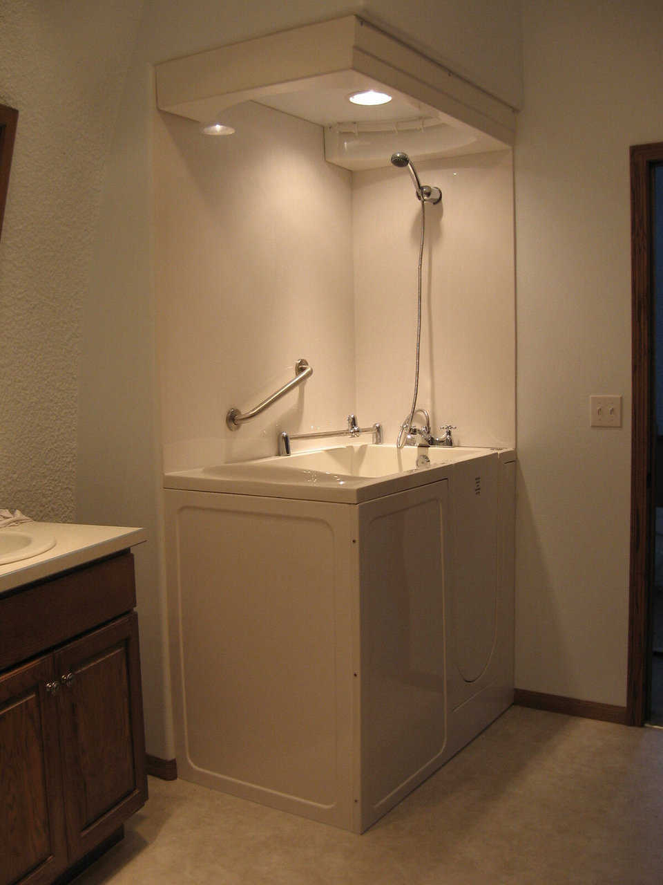 Master Bath — It includes a walk-in bathtub that makes bathing easier for Kay who has rheumatic arthritis.