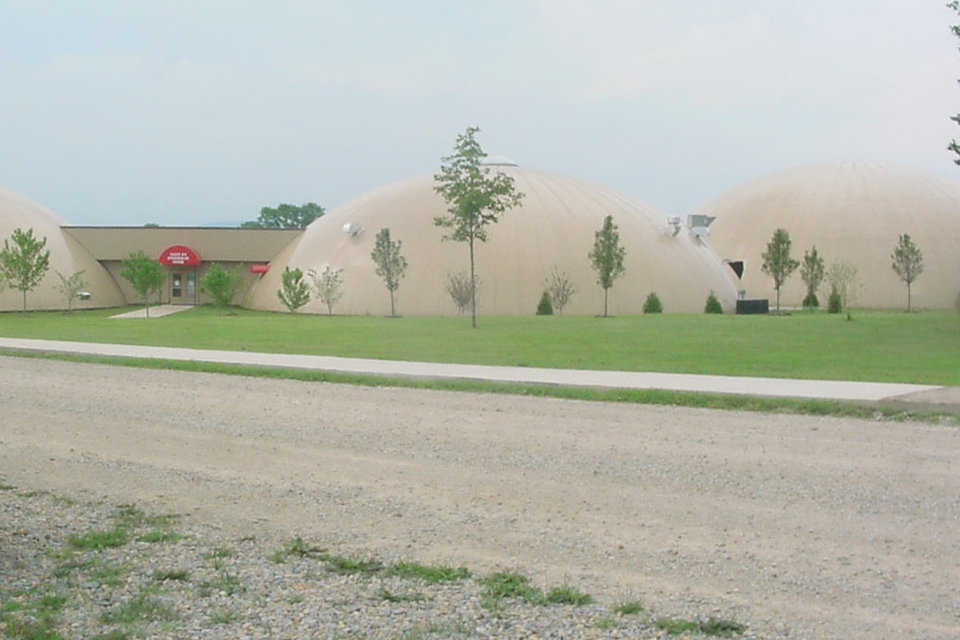 Fig 2.5 — During the 2007-2008 winter, Caledonia, Missouri experienced ice and wind storms that covered their area with two to three inches of ice and left people without power for up to two weeks. Superintendent Steve Yount said that the domes were unaffected by the cold, and, although they were without power, the domes retained their heat, so people spent their days warming up in the Monolithic Domes. The community wants their domes certified by the Red Cross as a designated disaster shelter and is looking into grants that would finance a generator.