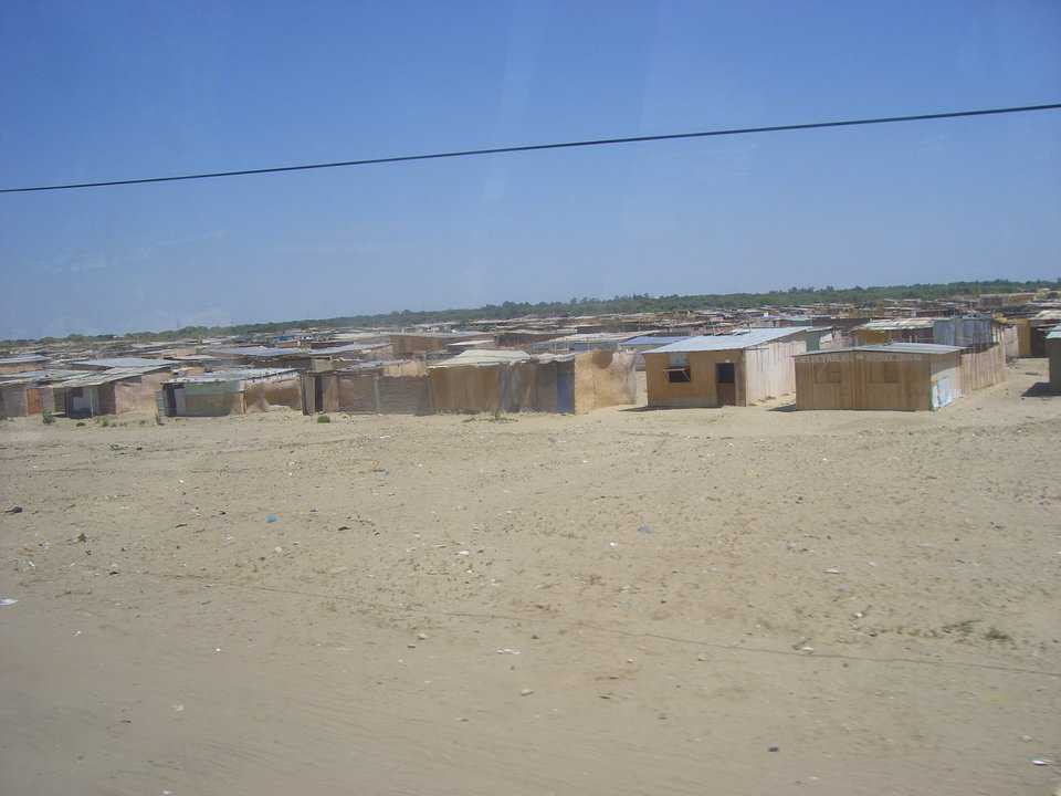 Current Housing near Piura — Currently areas like this are the only hope for many low-income workers.  This area stretched for nearly 8 miles.  Most of these are little more than straw mats with dirt floors, and little or no protection from rain and sun.
