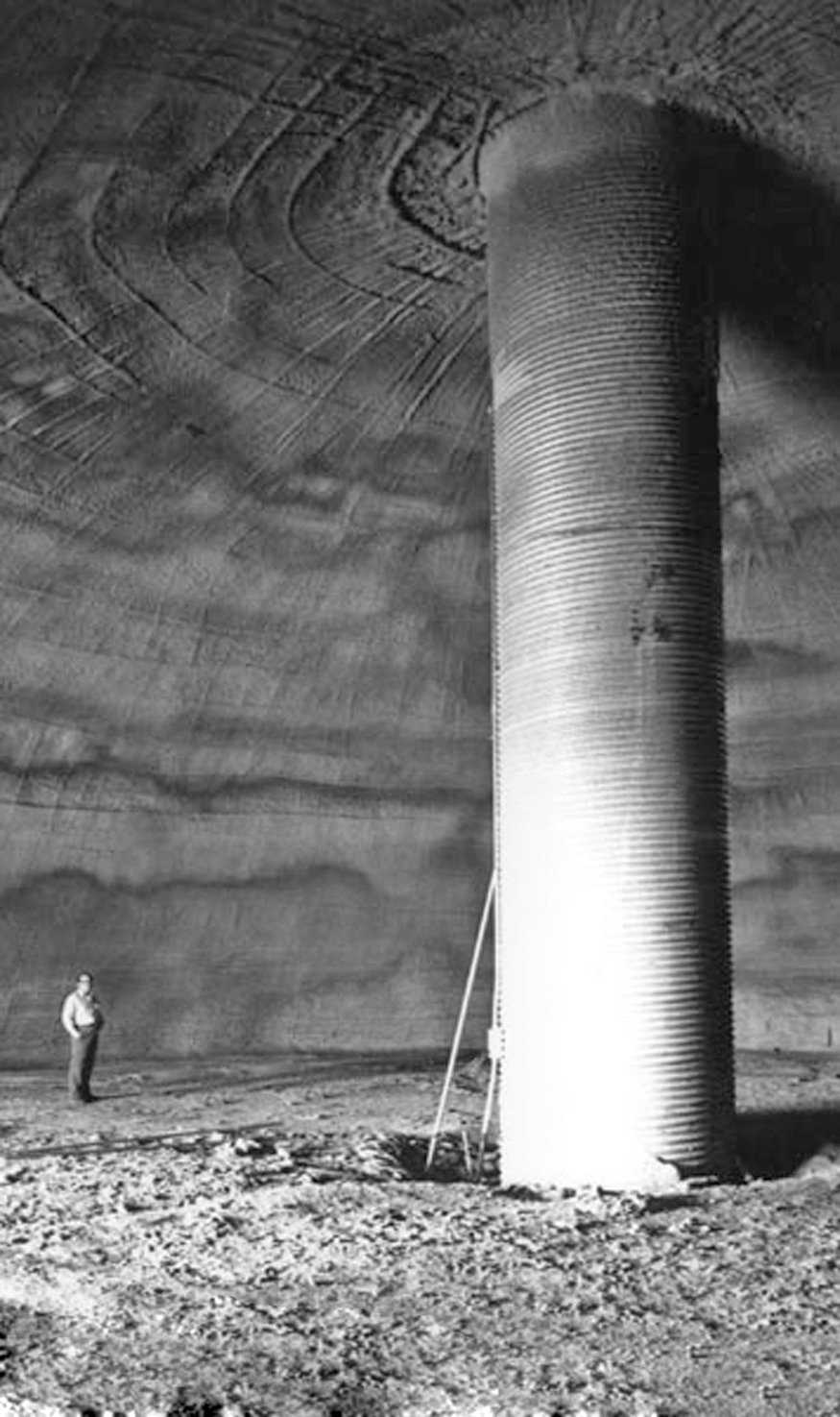 Very first Monolithic Dome — David surveys the interior of the very first Monolithic Dome. It was a potato storage in Shelley, Idaho, built in 1976.