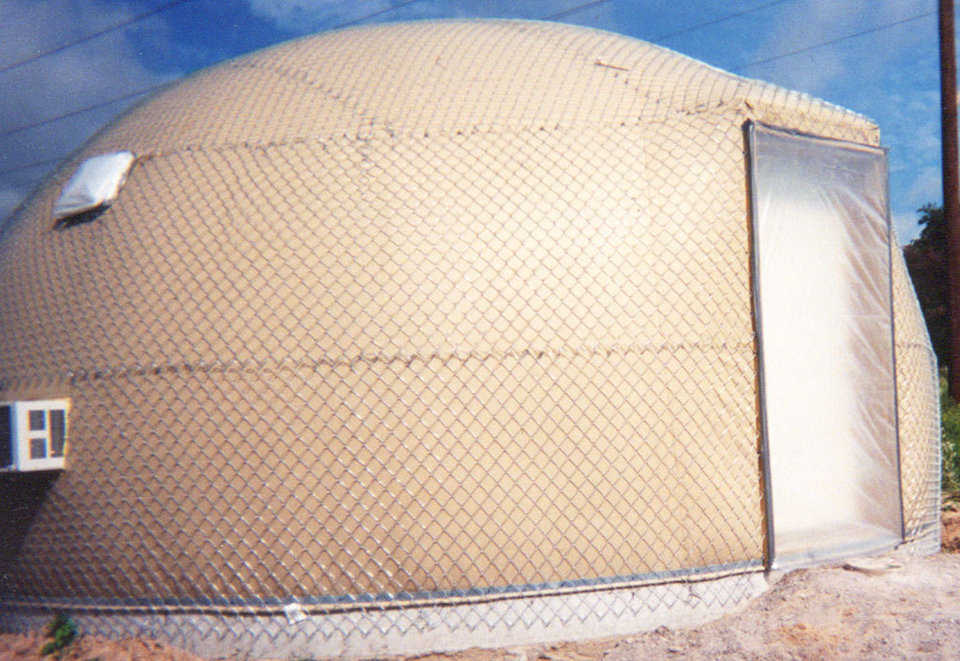 Chainshell — This dome is ready to be sprayed with shotcrete. Chainlink fence is galvanized and easily conforms to the shape of the dome.