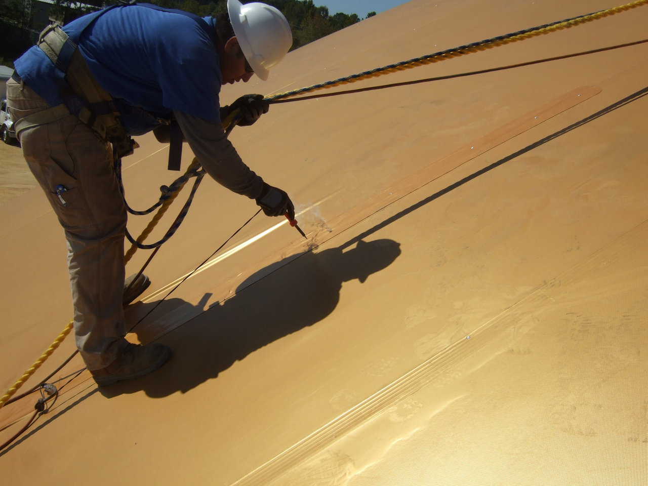 Melt Hole — This is an example of installing an Airform rivet. Begin by melting a hole in the fabric. The easiest way to melt a hole is with a soldering iron.