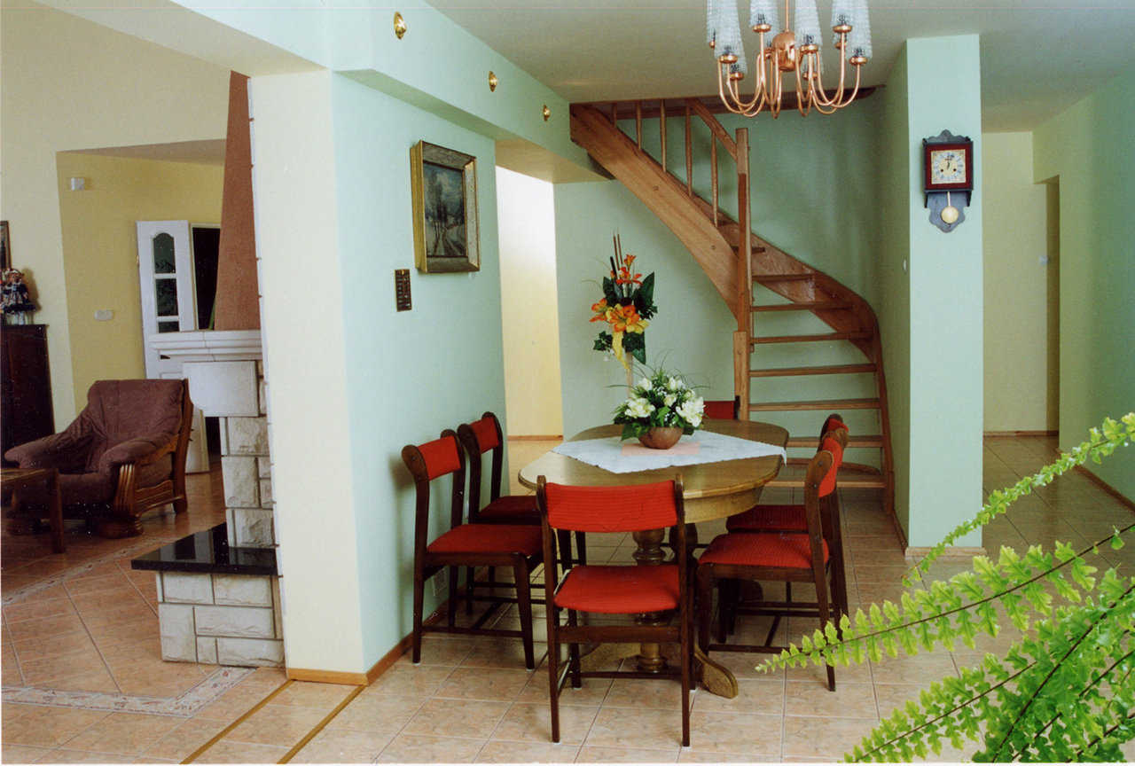 Dining area — Walls done in a kiwi green add warmth to the dining area.