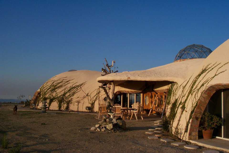 Dream Home — Morning light bathes this uniquely rustic Monolithic Dome dream home.