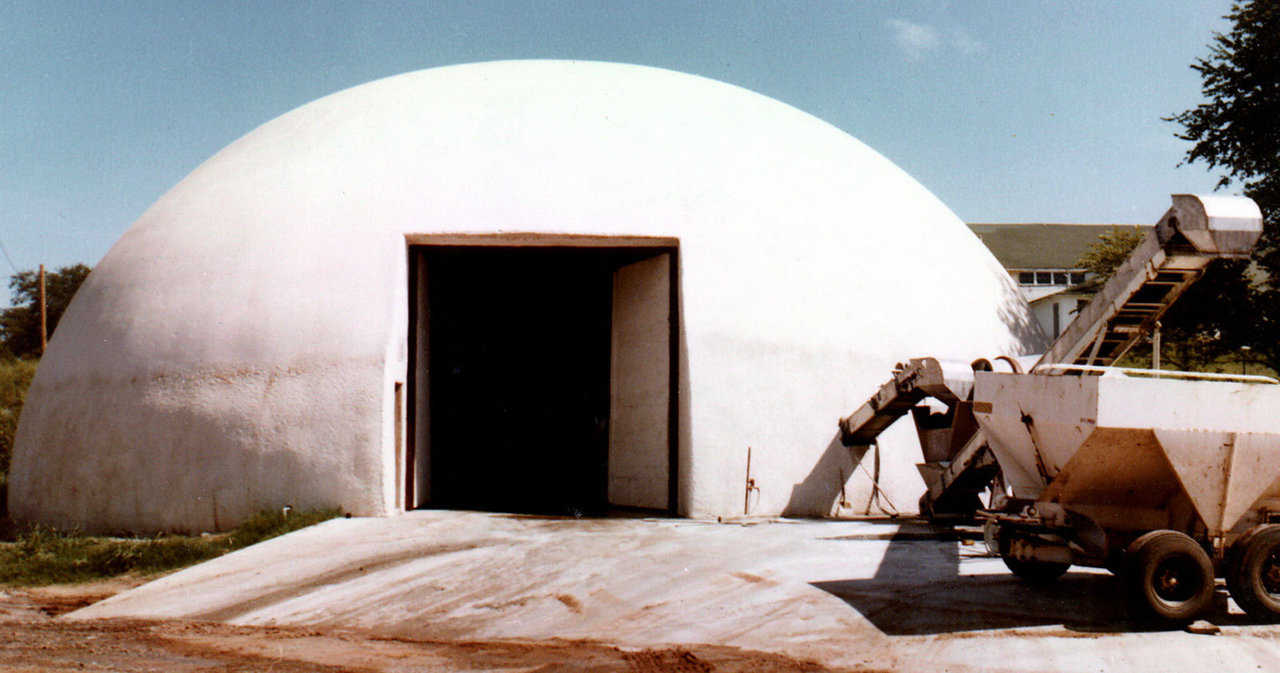 A Significant First! — In 1979, this 75’  diameter Monolithic Dome became our first fertilizer blend plant. Monolithic constructed it for Lincoln County Farm Service in Chandler, Oklahoma.