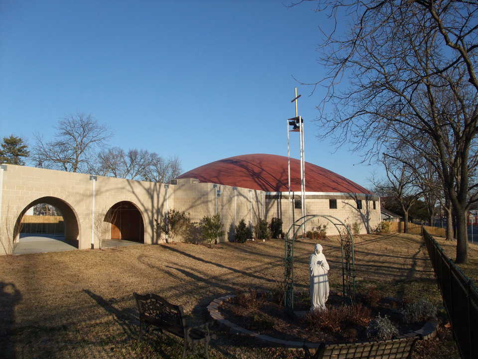 Stemwall with Airform Attached — At St. Joseph Catholic Church, it appears that the dome sits on top of a vertical stemwall of split face block. In reality, the dome is one piece with the stemwall attached. The stemwall is simply a wearing surface, or visual surface, on the lower part.