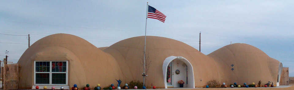 Monolithic Dome home in Shamrock, TX — In 2000, Shirley and Don Tuttle moved into their just-completed, four-dome home and began shopping for homeowners insurance that would take into account the durability and survivability of their Monolithic Domes. Their efforts netted a savings of more than $600.
