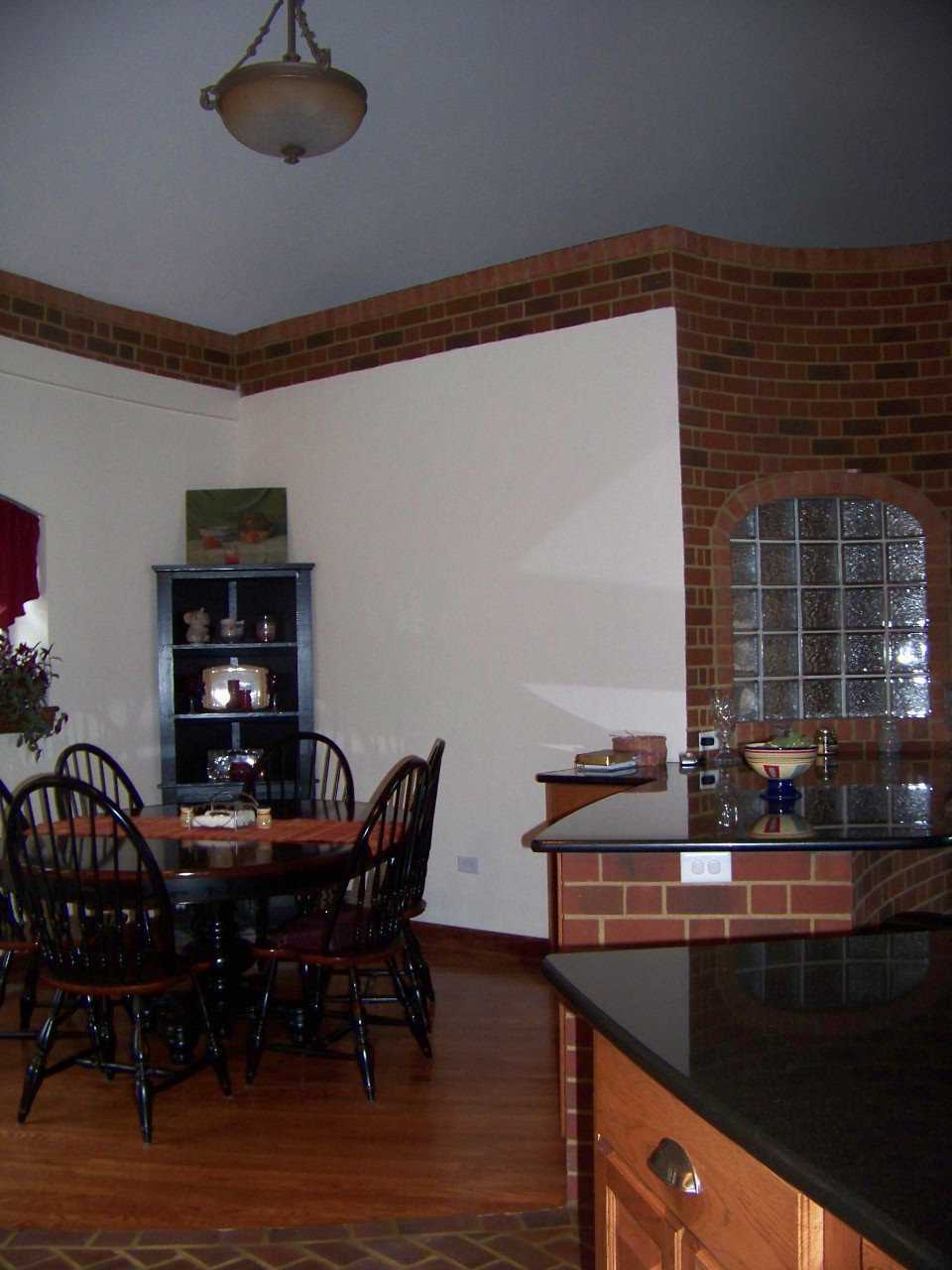 Dining Room   — In 2006, three years after attending a Monolithic Workshop, Joel Emerson began building his dome home.