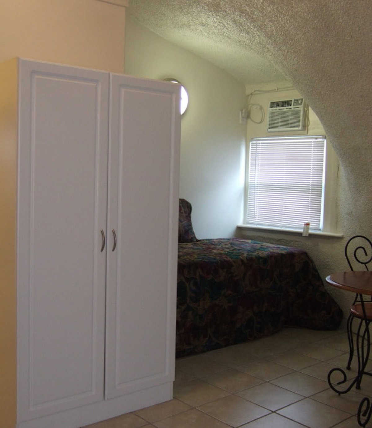 Sleeping Area — It’s furnished with a single bed or fold-out couch and a closet.