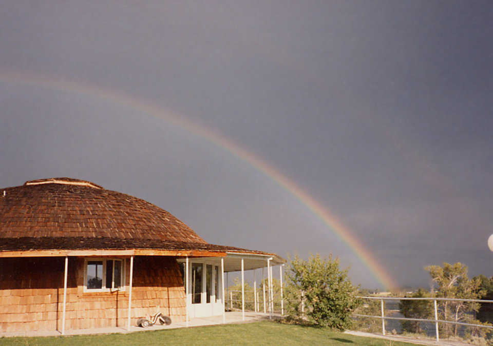 Crandall home, Menan, Idaho — After a storm the occupants of this Monolithic Dome home barely noticed, a rainbow appeared. Folks who live in Monolithic Domes tell us that storms simply do not bother them. One lady said, “If I hadn’t looked out the window, I wouldn’t have known we were having a storm.”