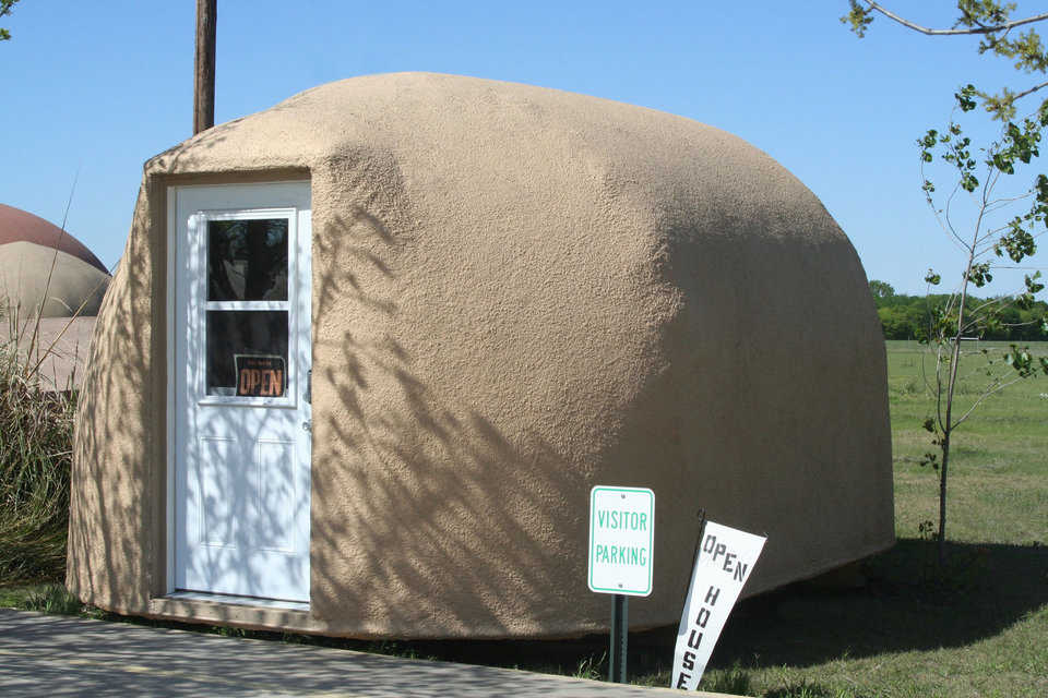 A Monolithic Cabin, Model 201 — Although small, this transportable Monolithic Cabin, like a Monolithic Dome, is disaster resistant, ultra energy-efficient, low maintenance and long lasting. Those qualities make it very cost effective — about as close to free as you can get.