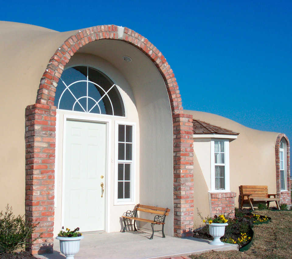 Shamrock Chateau — Marilee and Larry Byrne’s Monolithic Dome dream home, Shamrock Chateau consists of three interconnected domes that provide 2660 square feet of super-insulated, energy efficient living space.