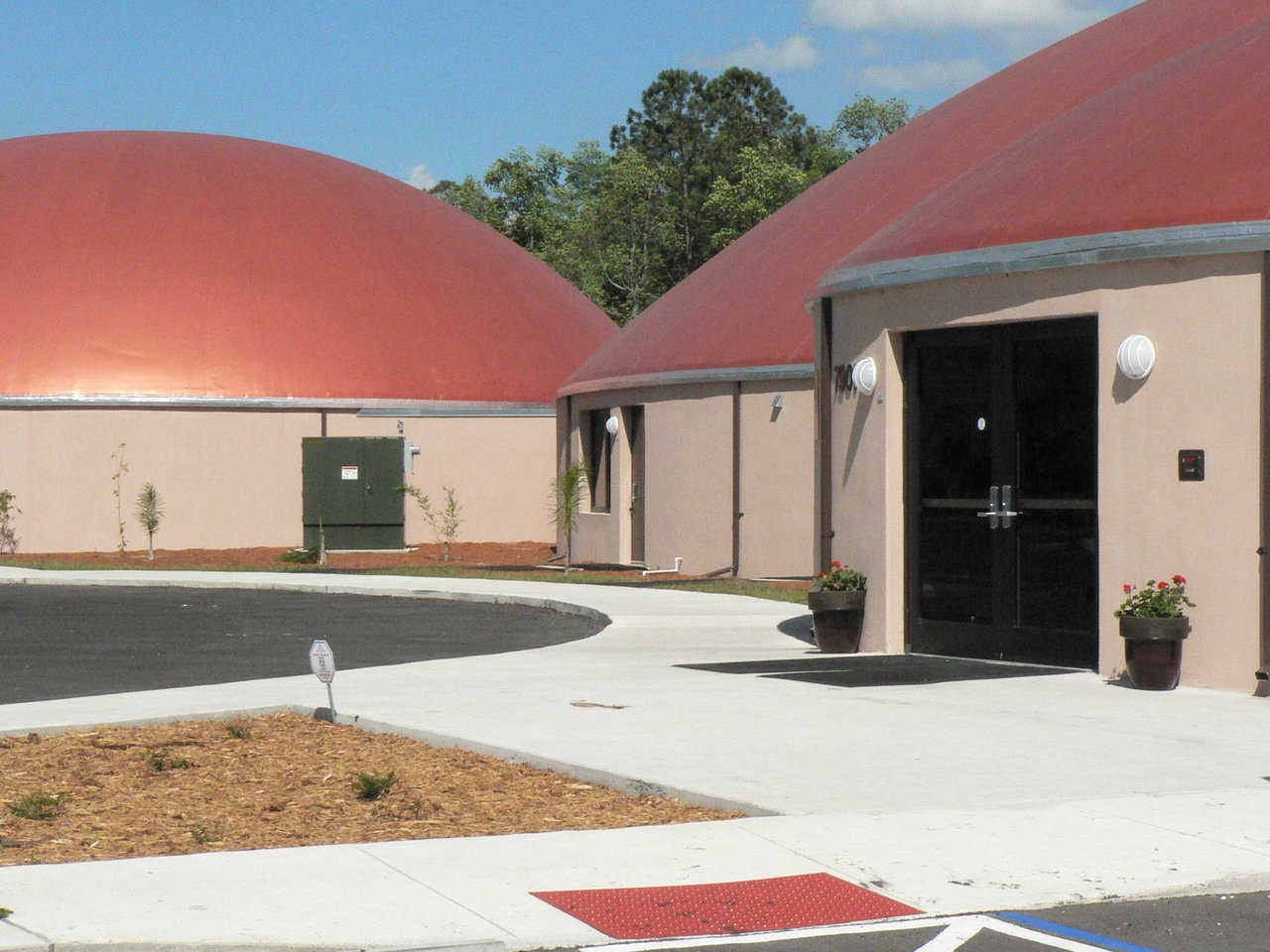 Five Monolithic Domes — Largest dome has a diameter of 132 feet and encompasses 10 classrooms surrounding a library; multipurpose dome has a diameter of 75 feet; three remaining domes each have a diameter of 44 feet and serve as administrative area, staff area and lab.