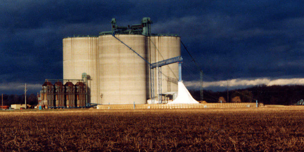 Grain Cover — It’s totally assembled and ready to start receiving grain. Center tower supports the grain conveyor that fills it. Grain drops through the center tower and under the cover.