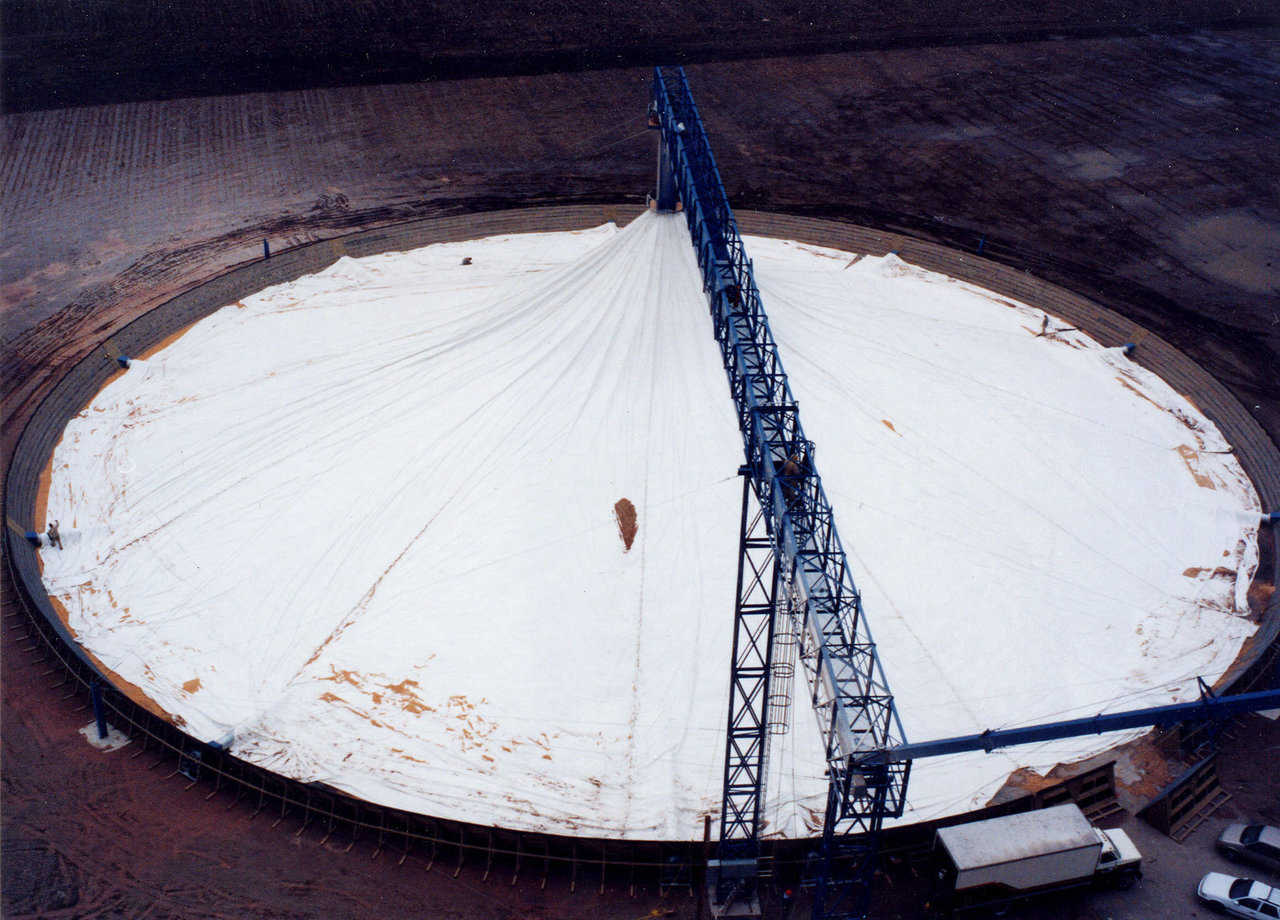 A completed grain pile — Grain is spread to the edges forming a weather tight storage.