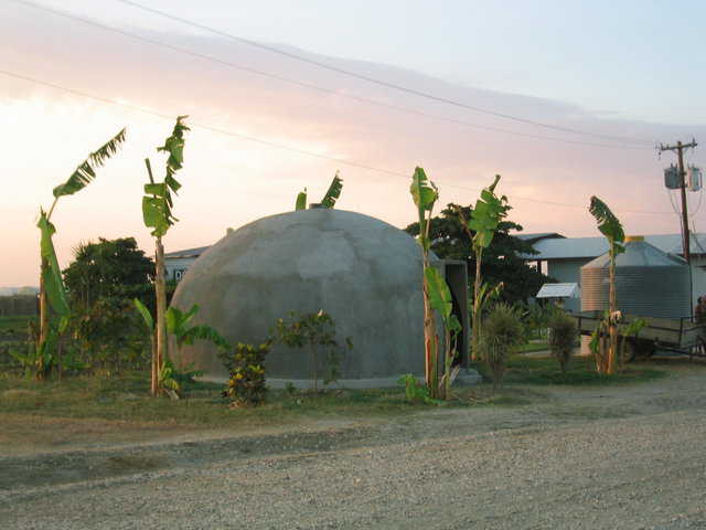 Ecoshells in Haiti — This EcoShell, located in Haiti, provides protection from hurricanes and infestation. A standard mud hut measures 160 sf. This EcoShell is twice the size – measuring 314 sf, yet costs the same to construct.