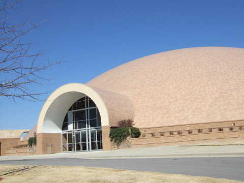 Faith Chapel Christian Center — This very large Monolithic Dome now has a beautifully finished, tiled exterior.