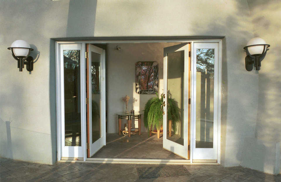 Welcome! — Main entryway features double glass doors. Stamped concrete porch surrounds all exterior levels of the dome.