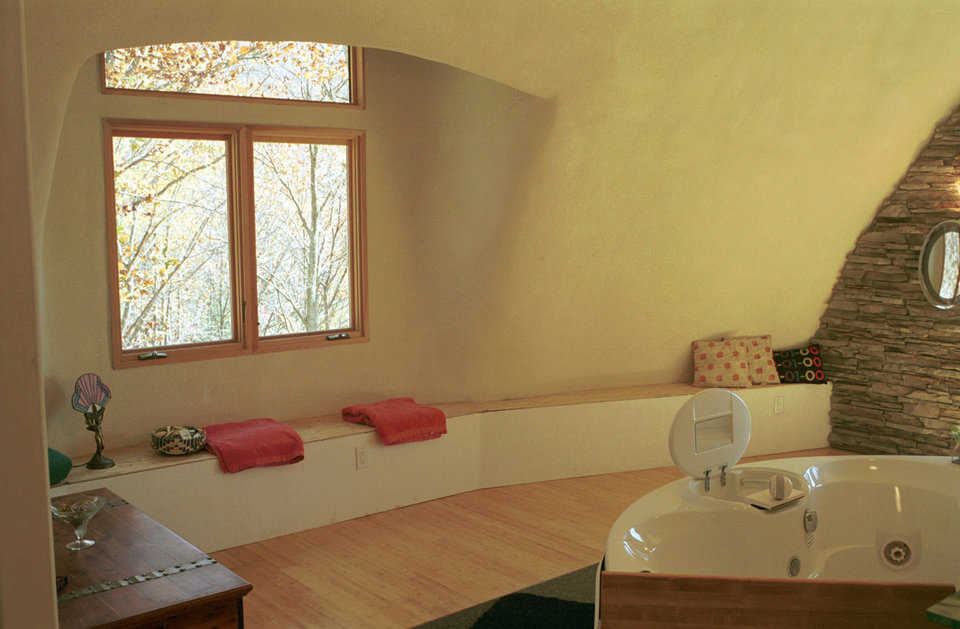 Relaxing! — A wide window bench in the master bath utilizes space and creates a comfortable relaxing area.