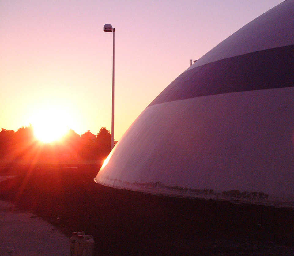 Sunset at Grand Meadow — In 2007, Grand Meadow Superintendent Brown told the Minnesota Legislature about the low energy costs of their Monolithic Dome facility.