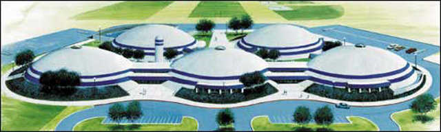 Grand Meadow School — In 2001, Grand Meadow ISD in Minnesota celebrated a ground breaking for its new school campus with five Monolithic Domes.