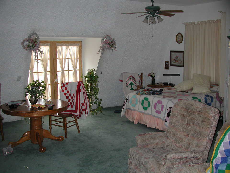 A sweet suite — It includes a sitting area, bedroom, dining area and french doors that lead to a balcony overlooking the atrium.