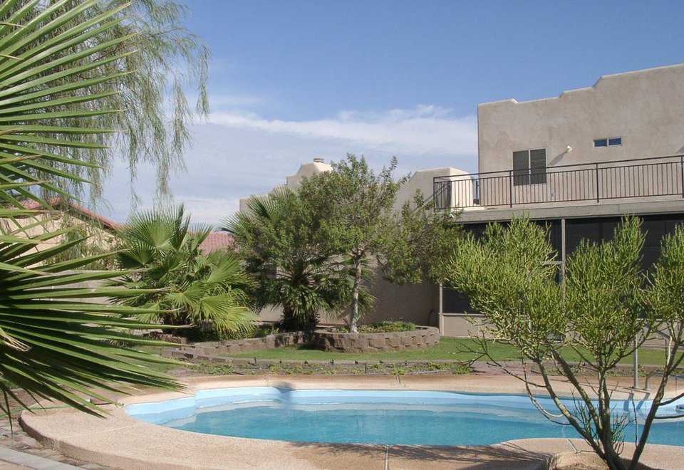 Beat the heat — The folks at Yumadome enjoy their pool.