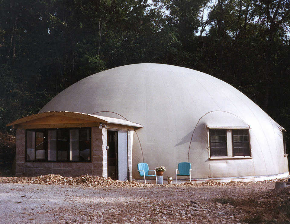 Home at last! — After many weather delays, Don Pass and Ron Boswell completed this 50′ × 20′ Monolithic Dome home. They finished the dome interior in just 6 weeks, including all cabinet work, floor coverings and sheet rock.
