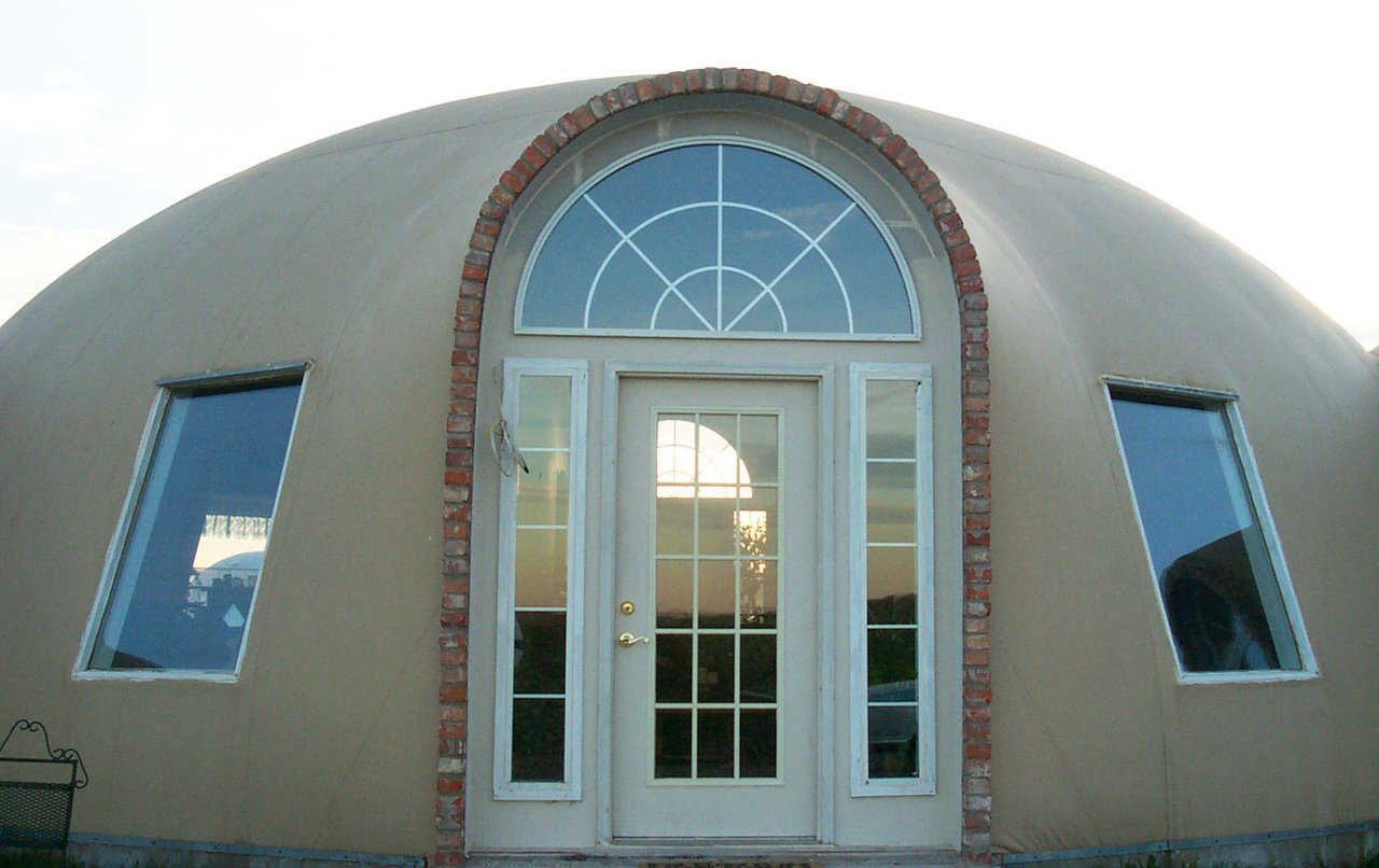 Stunning entryway — Specified engineering was incorporated in the Airform design that created this inviting, augmented front entryway.