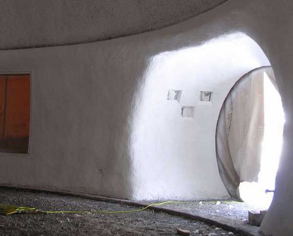 Cylinder opening — Glass blocks enhance the interior as well as the exterior of Peggy Atwood’s Monolithic Dome home in the Catskill National Forest, near Woodstock, New York.