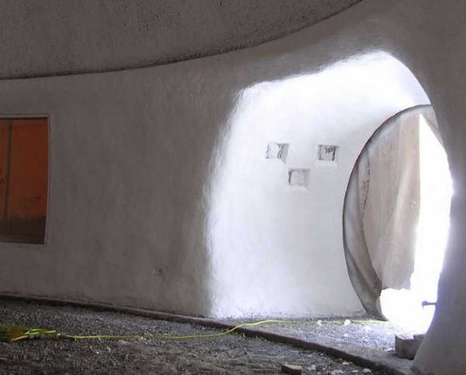 Cylinder opening —  Glass blocks enhance the interior as well as the exterior of Peggy Atwood’s Monolithic Dome home in the Catskill National Forest, near Woodstock, New York.