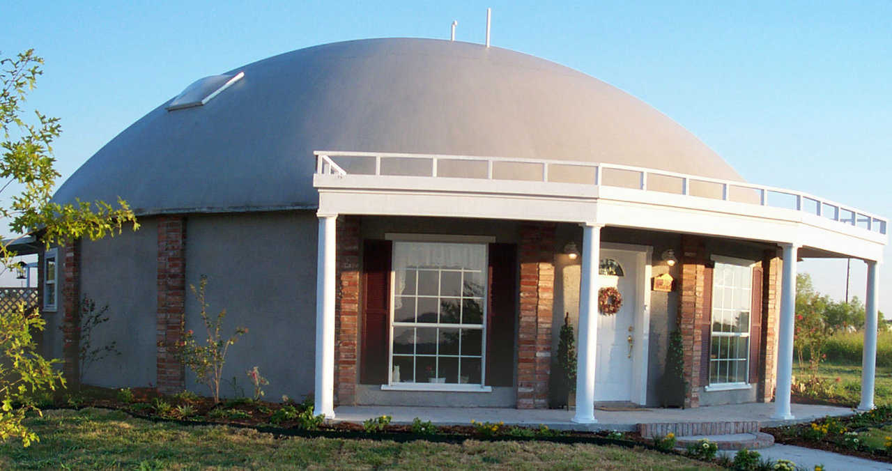 Square skylight — Home of Gary Clark in Italy, Texas utilizes a porch addition, inset windows on the Orion wall and square skylights on the second floor.