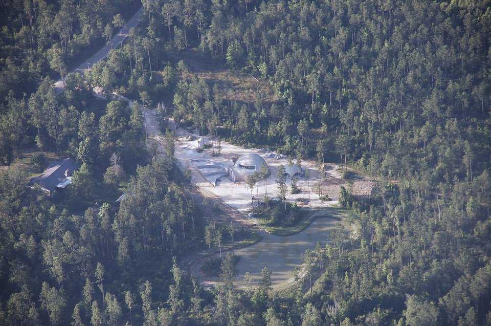 Good planning — The Simmons opted to have their dream-dome built into a hillside. Each of their dome’s two levels has easy, walk-out access to the outdoors. Inside, an elevator that Charlie designed — not stairs — provides transportation between floors.