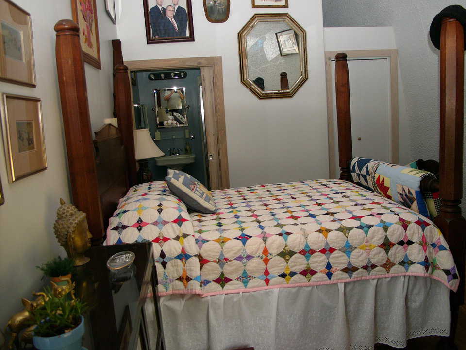 Homey and inviting — Margaret and Charlie enjoy their spacious, upper level bedroom.