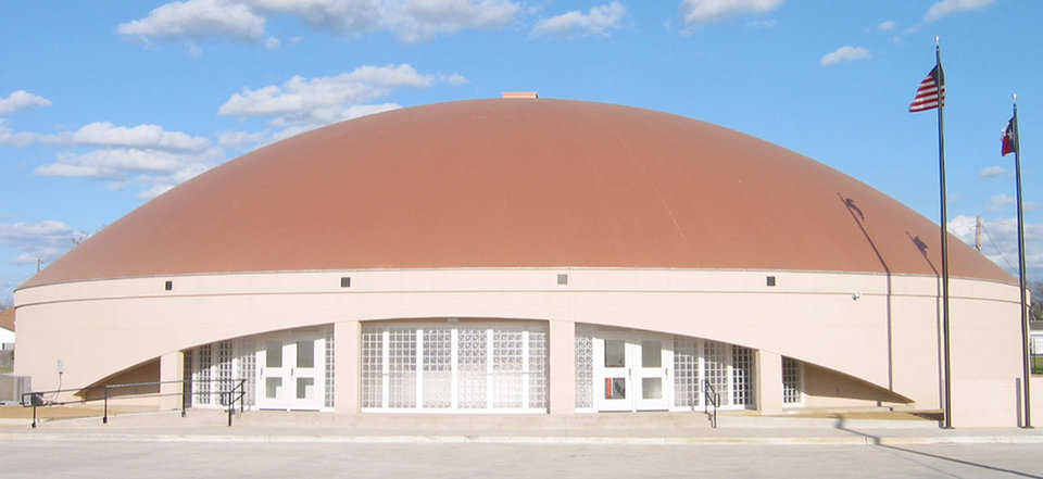 Avalon, Texas Multipurpose Center  — This Monolithic Dome gymnasium and center has a diameter of 124 feet and a height of 37 feet that includes a 12-foot-high stemwall.