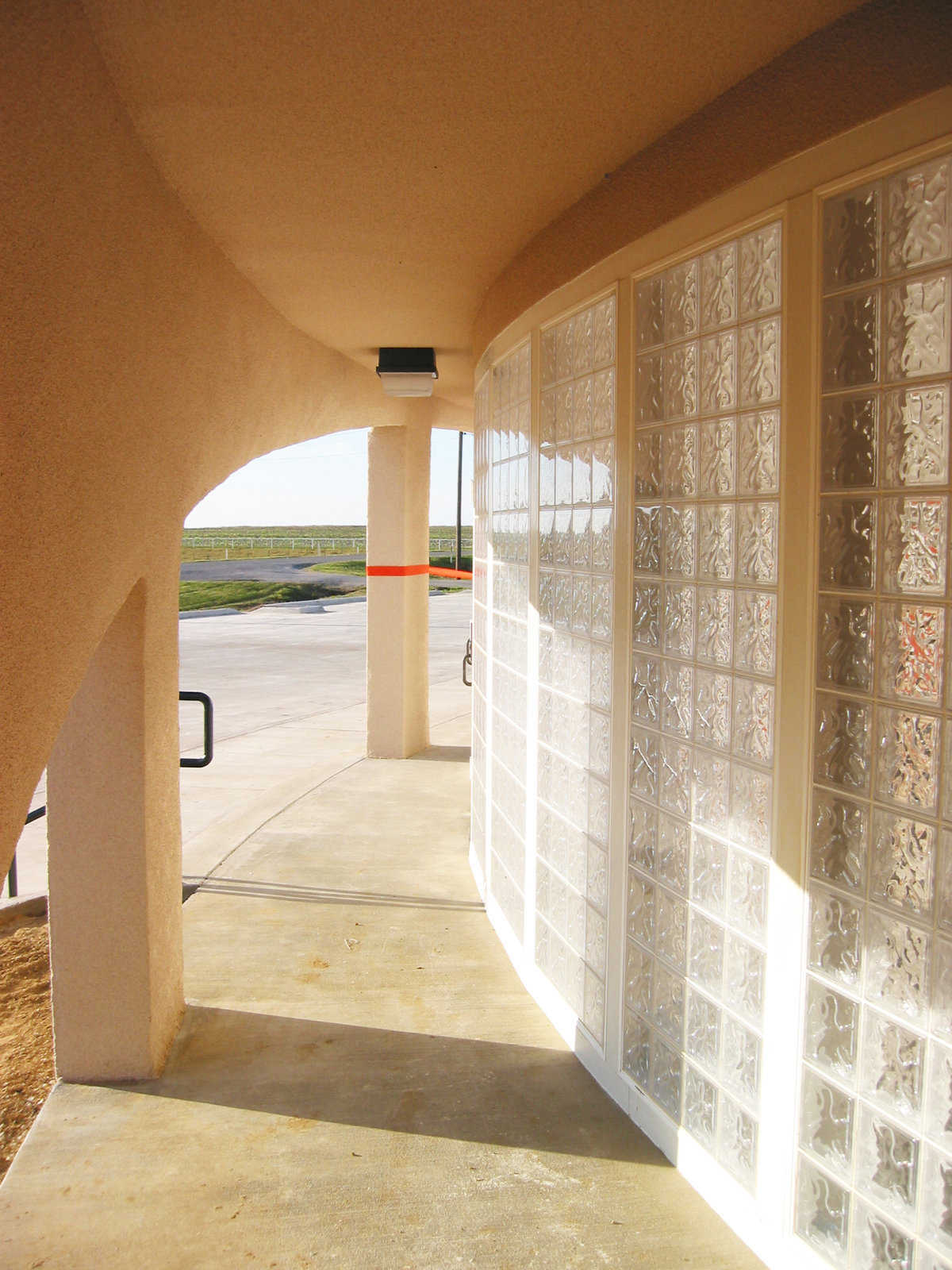 Let there be light! — A synthetic glass block in the front foyer adds a decorative detail and allows plenty of light into the entire structure.