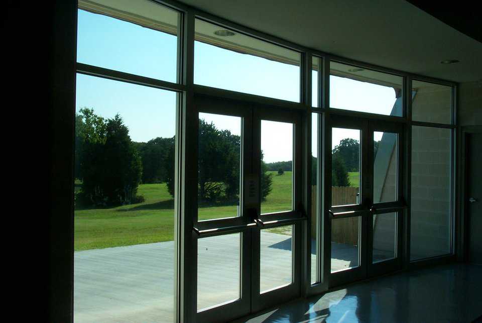 Entryway — Each entryway has two large glass doors.
