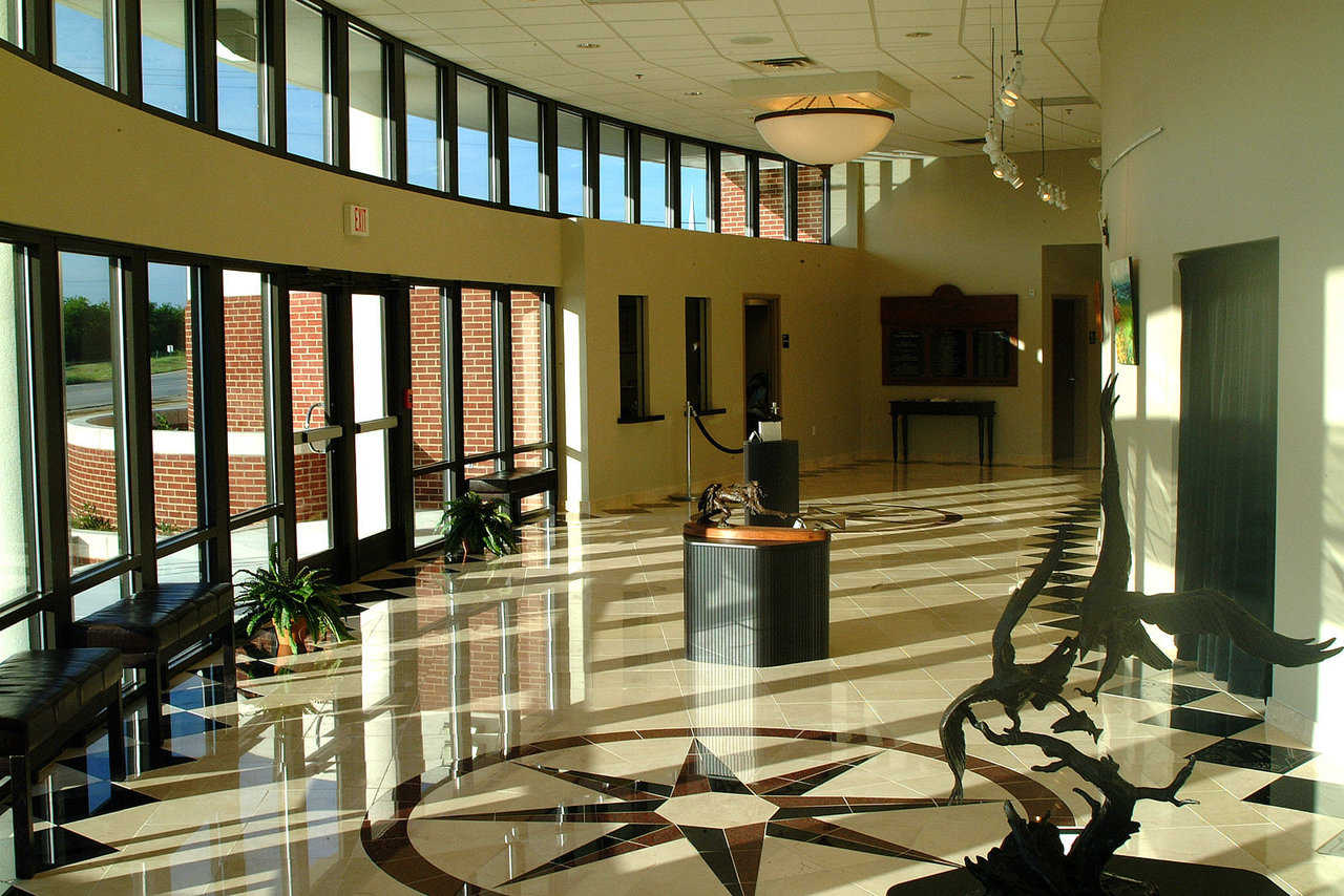 Lobby-Gallery — It curves around the 360-seat proscenium theater and provides a display area for students’ paintings, sculptures, jewelry and other creative items.