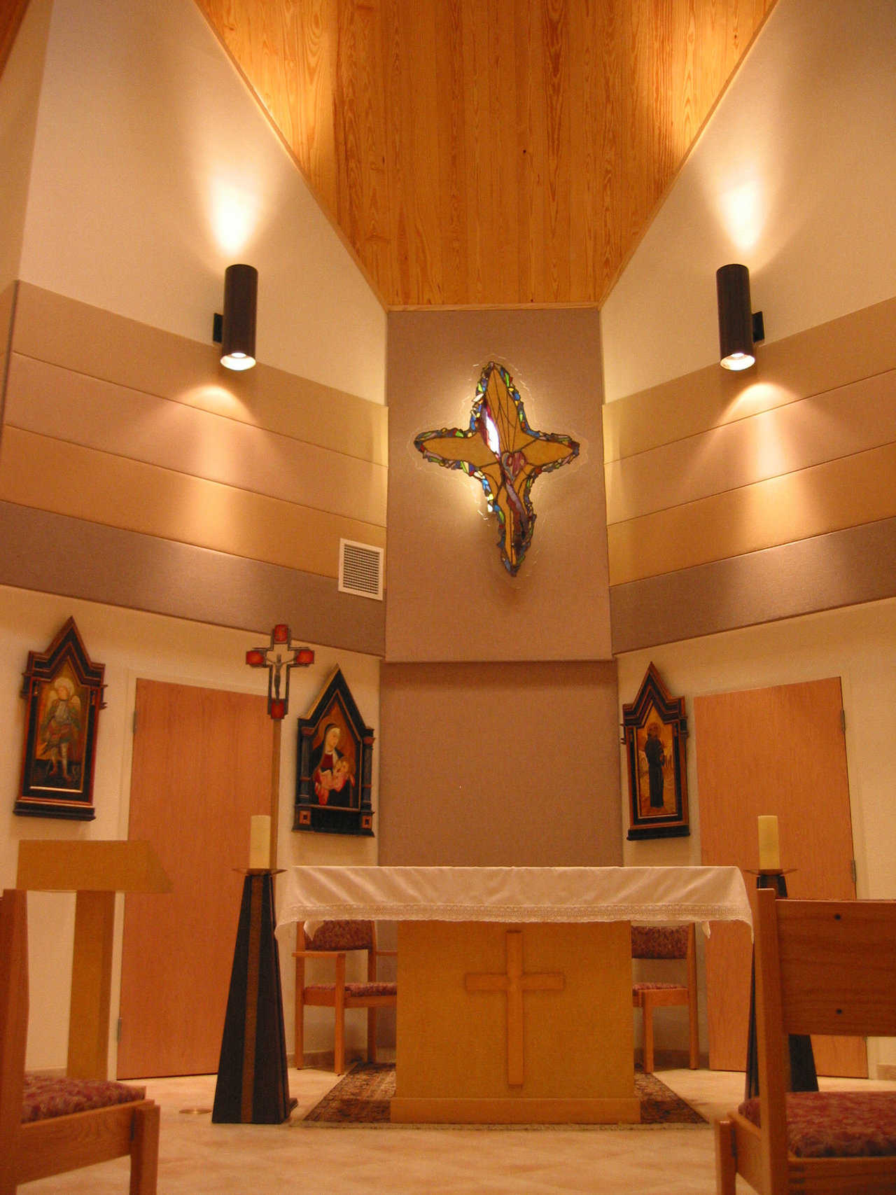 Chapel — Religious art, wood and ceramic tile enhance the school chapel.