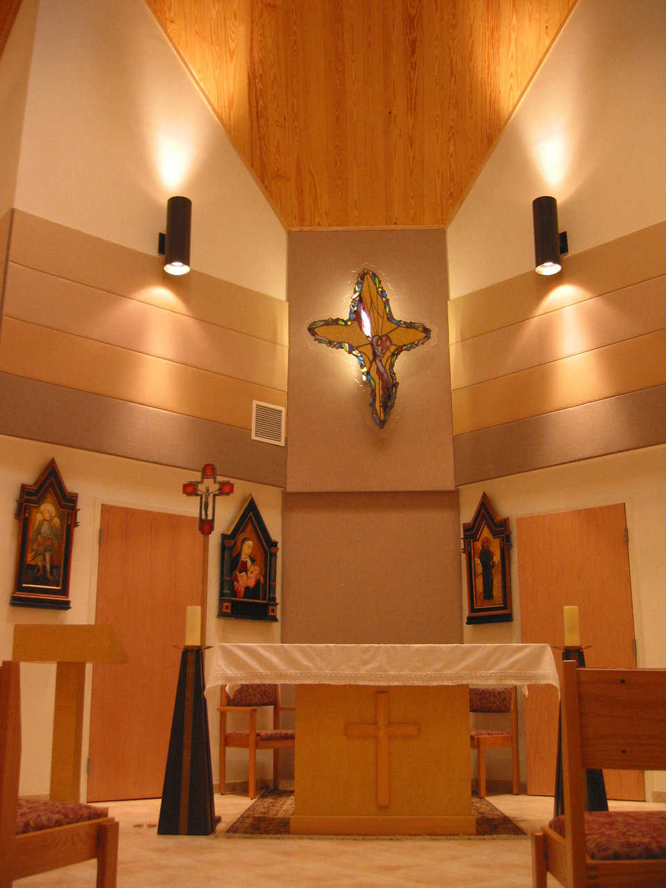 Chapel — Religious art, wood and ceramic tile enhance the school chapel.