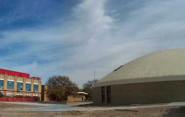 Old and new — In 1910 Texhoma built its first brick building, and in 2000 it built its first Monolithic Dome school facility.