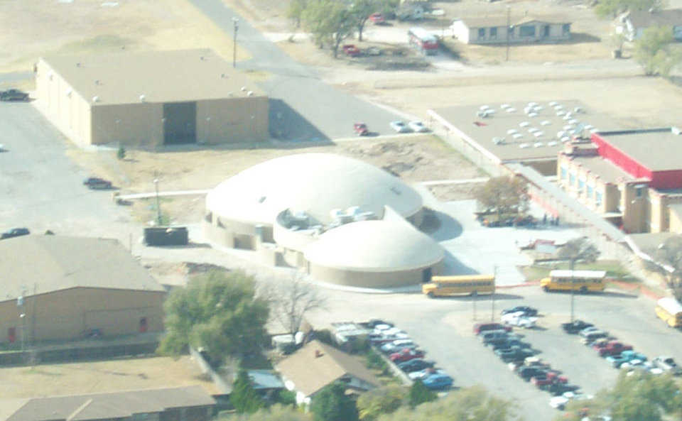 Two Monolithic Domes — Larger dome has a diameter of 108’ and the smaller has a diameter of 66’. The two domes, connected with conventional construction, provide 18,000 square feet of indoor space.