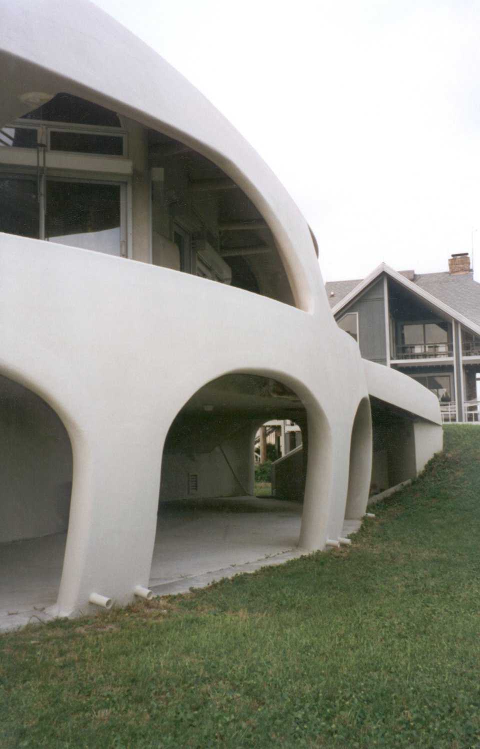 Foundation — The dome sits on a foundation attached to pilings buried deep into the ground. All concrete and steel reinforcement are interconnected. Notice the drainage pipes embedded in the dome to drain water from the deck above.