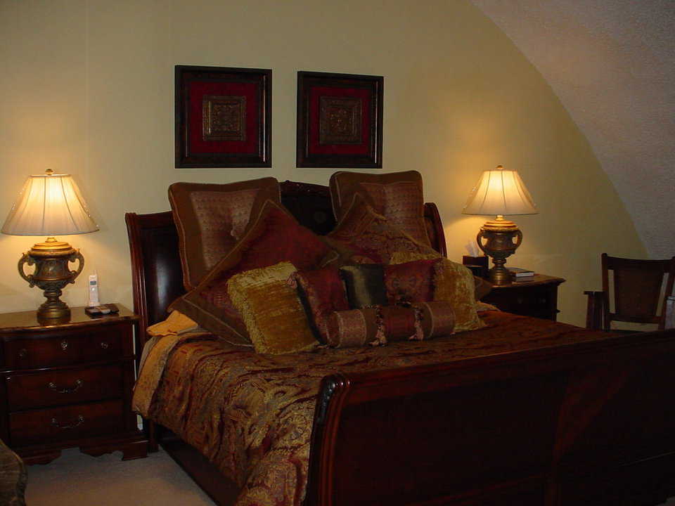 Master bedroom — It’s spacious, comfortably furnished and has an attached sitting room.